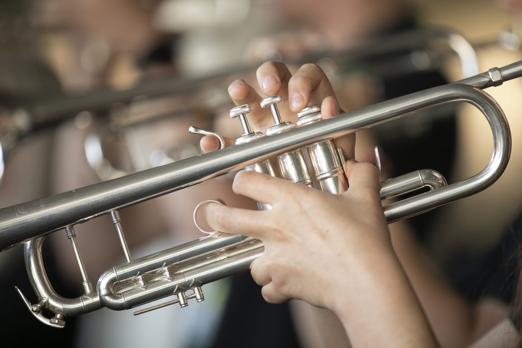 close up of a trumpet being played