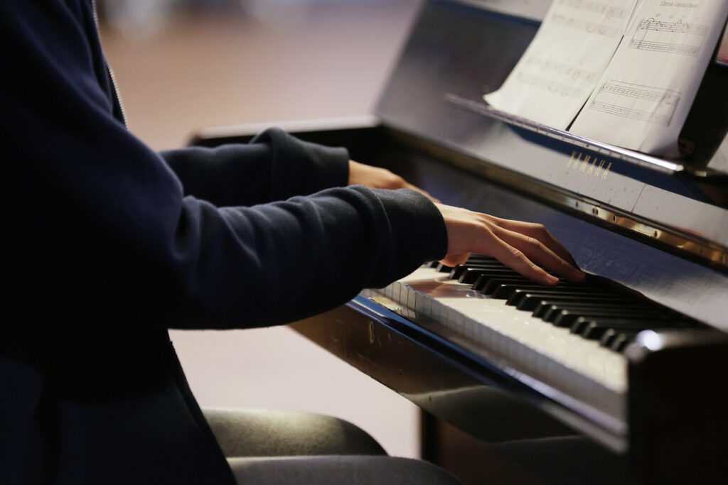 Someone playing the piano