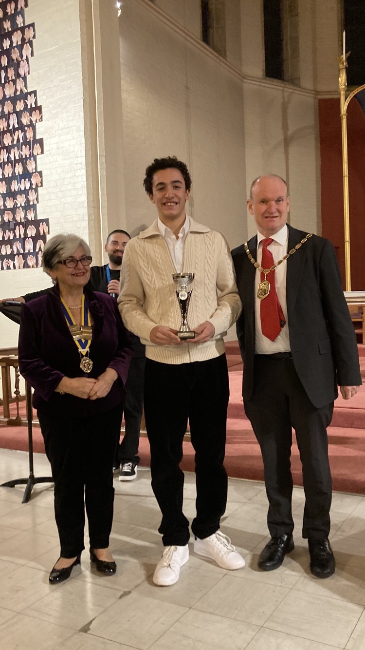Photo of the winner of the instrumental category of the Rotary Young Musician (Merton Heat Final) with the Mayor of Merton and Angeles from the Morden Rotary.