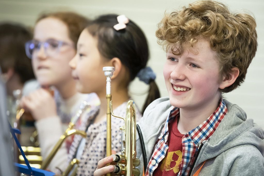 Photo of smiling band member